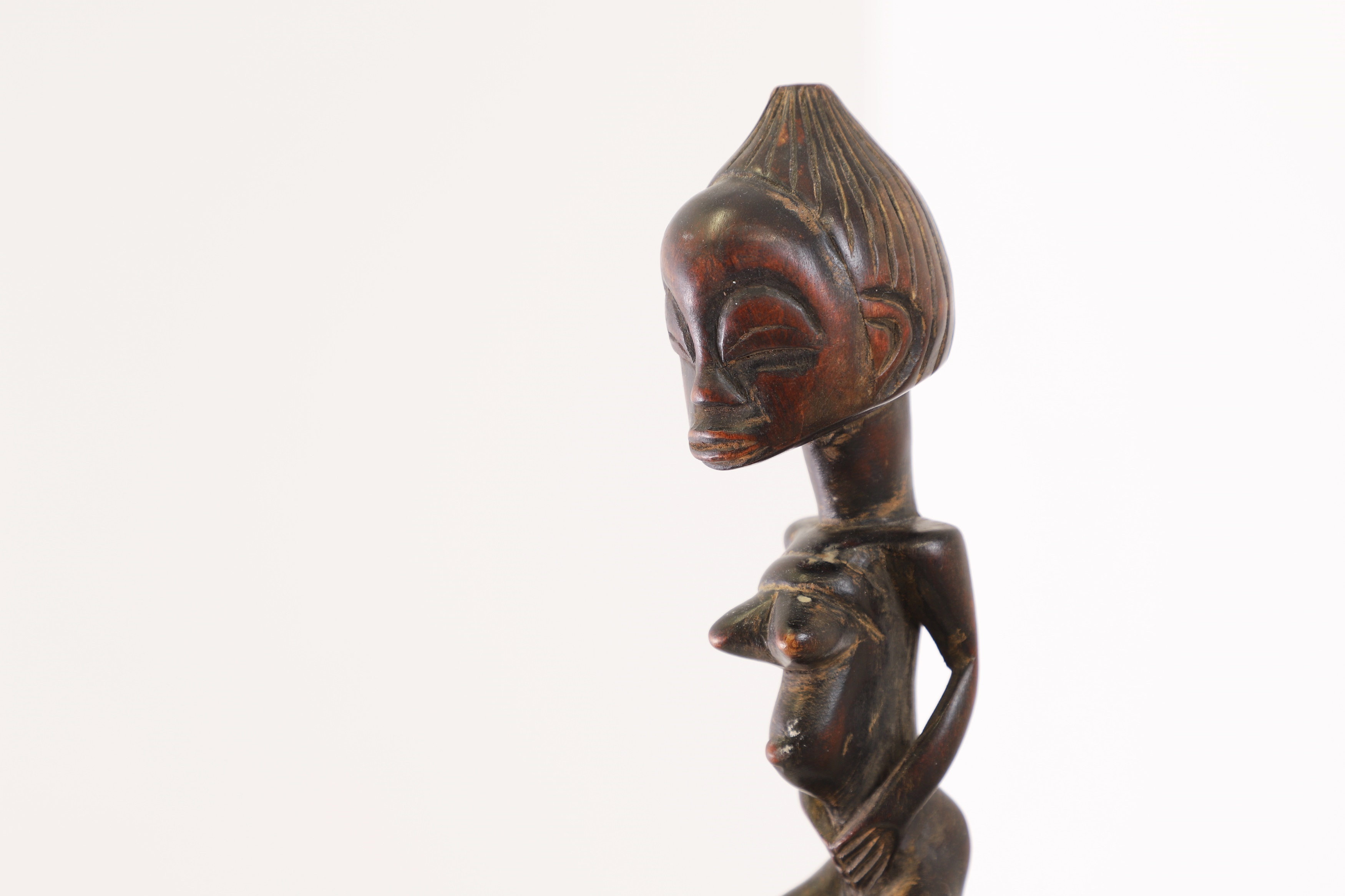 A Luba fertility or divination rattle, 20th century, Democratic Republic of Congo (£200-300)